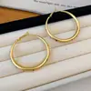 Pendientes de Aro de Aguja Plateada Transfronterizos Europeos y Americanos, Estilo Minimalista Metálico, Pendientes Versátiles Simples de Moda con un Diseño Único