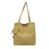 Bolso de hombro para mujer estilo coreano, bolso de mano simple de gran capacidad para estudiante, bolso tote ligero y artístico para niñas
