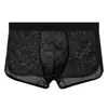 Venta al por mayor de ropa interior de malla de seda helada de color liso para hombre Huajielong, bóxers transpirables de talla grande de cintura media, disponibles para dropshipping
