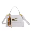 Diseño Compacto y Exquisito, Bolso Kelly con un Toque de Lujo Ligero y Alta Calidad, Bolso Cruzado para el Trabajo y el Uso Diario, Bolso de Mano Versátil y Elegante