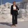 Fornecimento Exclusivo Transfronteiriço do Novo Conjunto Feminino Fashion de Outono: Cardigã Solto com Botões de Manga Longa e Calça de Perna Larga Agora Disponível