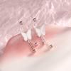 Pendientes de mariposa con hebilla de tornillo, pendientes coreanos de elfo súper hada, pendientes de borla largos de libro rojo, superventas para mujer