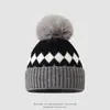 Gorro de punto jacquard estilo americano transfronterizo, gorro de pompón protector para orejas estilo coreano para niños mayores, gorro de lana cálido para niños de comercio exterior