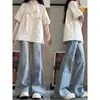 Jeans acampanados estilo americano para mujer, nuevo modelo otoño 2026, de tiro alto, adelgazantes, con un diseño de pierna ancha fluido para estudiantes de secundaria y preparatoria.