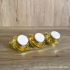 Una botella corona de 5g10g15g botella de plástico para crema muestra de crema botella de prueba de crema facial