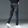 Jeans Azuis Masculinos de Outono, Corte Reto Solto, Marca Americana Nova Tendência 2026, Calças Casuais Elásticas Versáteis