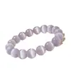 Pulsera original de cristal ojo de gato rosa para mujer, un artículo popular en las transmisiones en vivo de Douyin, disponible en stock, moderna y versátil, al por mayor
