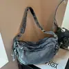 Bolso bandolera retro de mezclilla de nicho transfronterizo para mujer, nuevo estilo casual relajado 2026, bolso cruzado para el día a día
