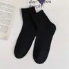 Calcetines para mujer primavera y otoño algodón peinado calcetines de media pantorrilla calcetines básicos lisos de moda para mujer calcetines hasta la rodilla calcetines blancos holgados