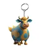 Novo produto transfronteiriço: chaveiro plano de acrílico colorido em formato de vaca de desenho animado, argola de chaveiro e pingente para carro/mochila