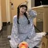 Nuevo cárdigan pijama de cuello redondo para mujer, con tejido de algodón nube, estampado de animalitos, manga larga y pantalón largo, adecuado para usar tanto en interiores como en exteriores en otoño.