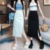 Saia preta em A feminina design de primavera saia plissada com fenda cintura alta saia modeladora de quadril saia de comprimento médio