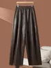 Pantalones de Cuero Elásticos para Mujer 2026 Estilo Nuevo Cintura Elástica de Moda Versátiles de Corte Holgado Pantalones Curvos