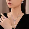 Exquisito collar de flor de circón con forma de gota de agua estilo palacio, cadena para la clavícula de nicho de lujo ligero, juego de joyería de estilo dulce