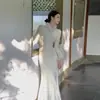 Vestido Longo Cheongsam com Cintura Fina e Quadril Cauda de Peixe Gola de Pele para Mulheres Novo Outono e Inverno Nicho Jacquard Saia Longa