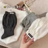 Calcetines estilo Miu para mujer, primavera y otoño, calcetines de media pantorrilla inspirados en el ballet, estilo coreano con etiquetas de tela de letras, puño de burbuja, sin costuras, grises y con volantes