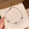 Pulsera de flor de doble capa con circonita vintage de diseño único, versátil y elegante, que ofrece un lujo ligero y una sensación sofisticada