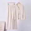 Conjunto de dos piezas de suéter de punto con botones grandes transfronterizo para mujer, nuevo estilo otoño e invierno 2025, conjunto de pantalones anchos casuales holgados, moderno