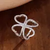 Anillo de trébol nuevo estilo coreano hueco anillo de corazón de melocotón de lujo ligero chapado en platino Mori pulsera ins