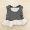 Ropa infantil fresca y linda estilo princesa en capas, shorts florales, empalme de encaje, chaleco de imitación de dos piezas, conjunto para niñas