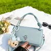 Bolsa Pequena Quadrada de Moda Primavera para Mulheres 2026 Nova Bolsa Transversal de Ombro com Padrão Lichia Retrô Bolsa de Braço de Alta Qualidade