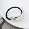 Estilo punk europeo y americano metal personalidad alta calidad cuerda para la cabeza semicírculo tubo redondo anillo para el pelo cuerda elástica para el pelo Balot fabricantes al por mayor