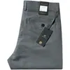 Estación europea pantalones finos de primavera y verano para hombre modal sarga sin planchar cómodos de algodón rectos holgados casuales