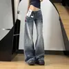 Jeans Americano Retrô Lavado Desgastado de Cintura Baixa Micro Flare Feminino Outono/Inverno Novo Calça de Cintura Alta Emagrecedora de Comprimento Total Wide Leg