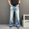 Calça jeans flare azul claro com lavagem snowflake para homens, estilo básico versátil para primavera e outono, calça longa casual que afina e alonga as pernas