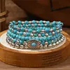 Nuevo producto transfronterizo: Sombrero estilo vaquero occidental con cabeza de toro turquesa, pulsera de cordón elástico multicapa, juego de pulseras de cuentas de varias piezas