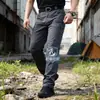 Calças Táticas Ix5 Masculinas para Uso Externo Corte Amplo Múltiplos Bolsos Resistentes ao Desgaste Calças para Tarefas Especiais Calças de Trabalho Masculinas Multiuso Camuflagem Cp
