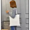 Nova Bolsa Simples de Lona Branca para Mulheres 2022 Grande Capacidade para Lazer Viagem Compras para Estampar logo