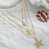 Collar Colgante de Perla y Estrella de Mar de Tres Capas Moda Europea y Americana Diseño de Nicho Retro Aleación de Concha y Caracola Collar para Niñas