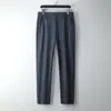 Pantalones Casuales de Lujo Ligero para Hombre 2026 Otoño e Invierno Nuevo Estilo Cintura Elástica Pantalones de Vestir Elásticos en Cuatro Direcciones Resistentes a las Arrugas Pierna Recta Pantalones Largos