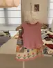 Xq262672 Conjunto de Colete para Meninas 2026 Nova Coleção Primavera e Verão Estiloso Colete sem Mangas e Saia Floral Conjunto de Duas Peças