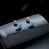 Brincos Cluster de Diamante Cheio de Novo Estilo Transfronteiriços para Homens, Modernos e Versáteis, Brincos de Flor de Íris em Forma de Cruz de Alto Padrão para Mulheres