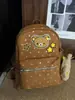 Mochila Marca Oso Viento Soleado Caramelo Estrella Estilo Chica Dulce Coreana Retro Café con Leche Salida Diaria Pequeña Linda Versátil