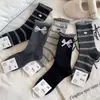 Nuevos calcetines de altura media para otoño e invierno para mujer, calcetines apilados de doble aguja estilo japonés, calcetines largos decorativos de algodón transpirables, venta al por mayor desde el fabricante