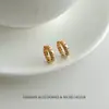 Estilo retro francés, de alta gama, diseño minimalista de hueso de serpiente con detalles de diamantes, ligeros y lujosos, de nicho y exquisitos, pendientes versátiles y a la moda