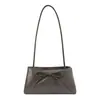 Bolso de Mano Simple y Elegante Estilo Coreano Nuevo Verano 2026 Versátil para el Trabajo con Lazo Dulce Bolso de Hombro de Moda para Mujer