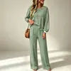Moda feminina europeia e americana transfronteiriça outono 2026 novo conjunto casual de calças compridas listradas de malha e roupa esportiva para mulheres na Amazon