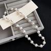 Moda simple de alta gama Perla Metal costura cadena clavícula nicho temperamento cadena clavícula suéter suéter cadena