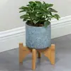 Pequeño soporte para flores de madera maciza, soporte para flores cuadrado de bambú cruzado, soporte para flores de hotel, soporte de piso de montaje de escritorio