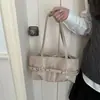 Bolso de hombro retro ins coreano 2026 nuevo diseño de moda bolso tote simple para el día a día bolso de mano de diseño de nicho moderno
