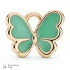 Accesorios para joyería DIY más vendidos a nivel transfronterizo: colgantes, pulseras, pendientes, collares de la serie flor y mariposa, y nuevos dijes para llaveros