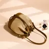 Bolso Cubo Pequeño para Mujer, Estilo de Alta Gama, Nuevo Bolso Cubo de Mercado Nicho 2025, Bolso de Mano Súper Popular, Bolso Cruzado para Verano