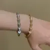 Pulsera de Oro con Diamantes Completos Estilo Old Money 2026 Nuevo Pulsera de Diseño de Marca Pequeña para Niñas Joyería de Mano Simple de Alta Moda
