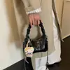 Bolso de mano tejido plisado de alta calidad para mujer, nueva colección de verano 2026, bolso cruzado con correa de cadena para el trabajo