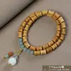 Pulseira de contas de oração budista de madeira crua natural, vendida a quente, sândalo dourado, sândalo Barbie, pulseira colecionável para homens e mulheres, fornecimento para live-stream