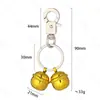 Llavero de campana de cobre transfronterizo gato y perro Campana crujiente diy collar para mascotas hebilla de perro campana de metal colgante para mochila